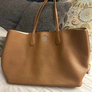 Brown leather Tory Burch bag. Barely used. A few wear marks inside.